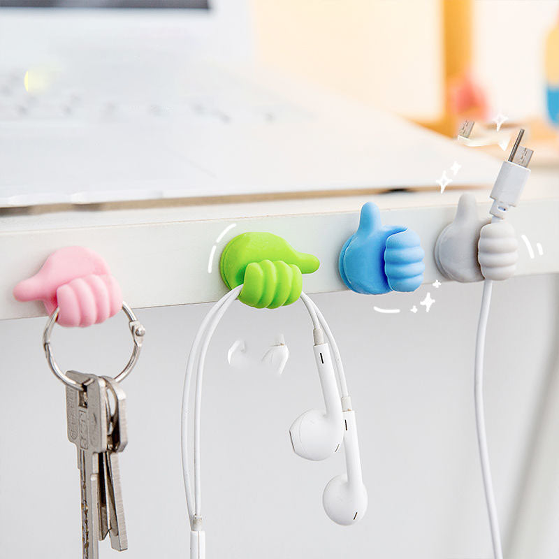 https://homeycomplex.com/products/thumbs-up-hook-multifunctional-mini-holder?variant=40956893757572